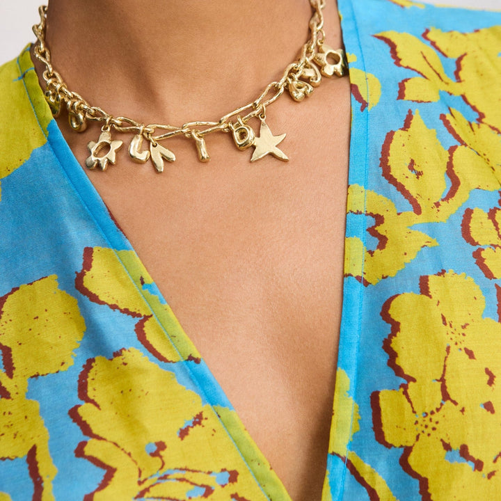 Gold Calypso Charm Necklace