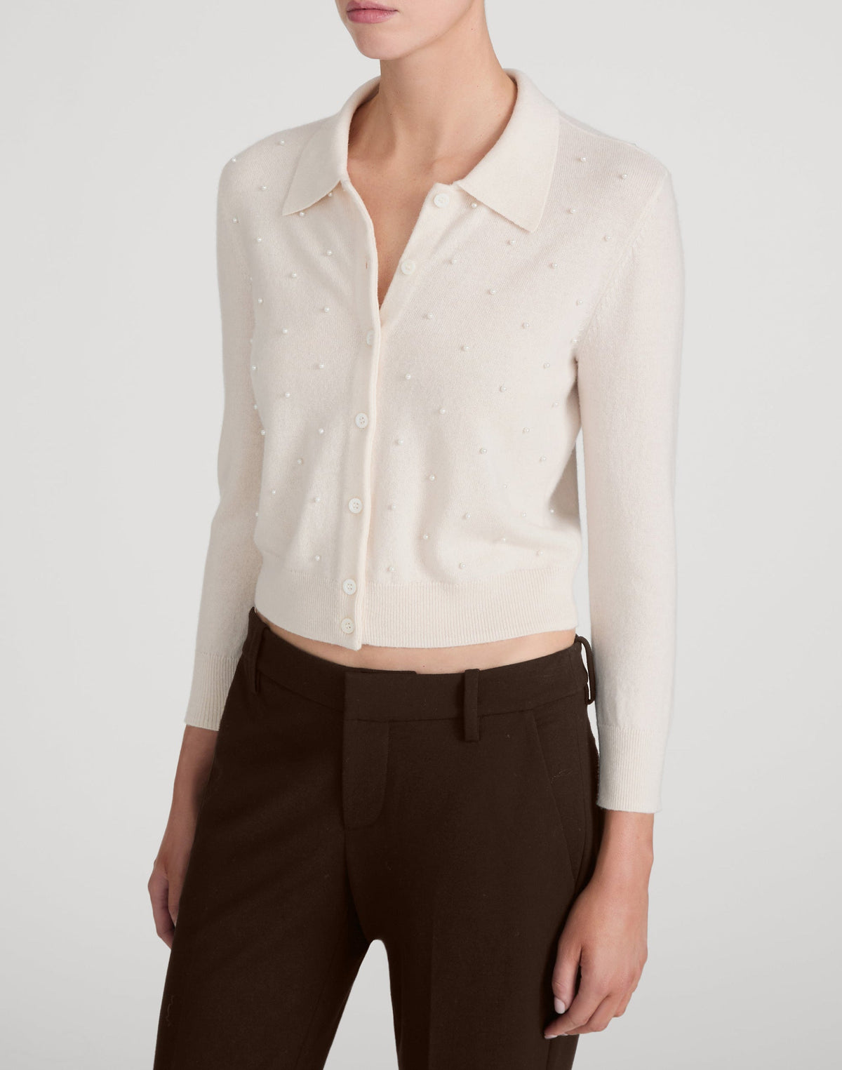 FRAME Cream Pearl Cardi on model, side